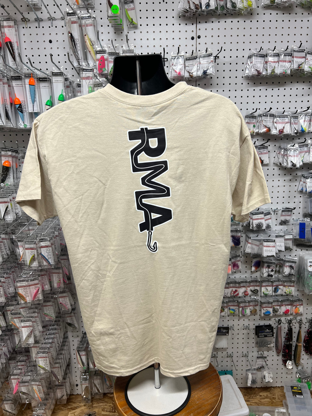 Large RMA T-Shirt with black RMA logo, cream short-sleeve crew neck