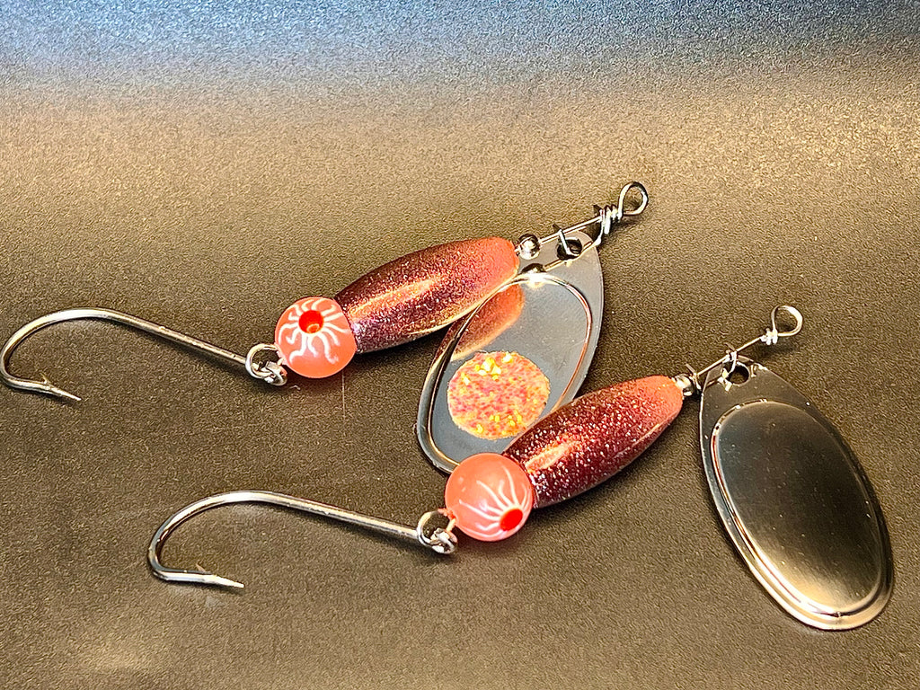 Voodoo inline spinner lure set: two orange-red bodies with gold-speckled blades and hooks