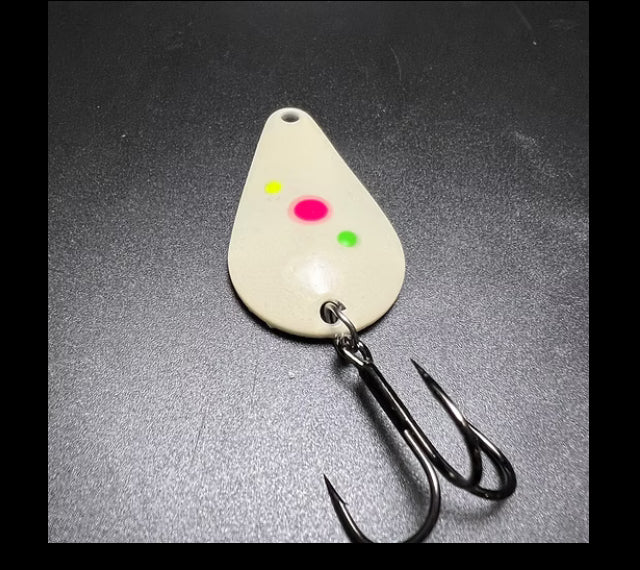RMA casting spoon with white body, bright dots, and treble hooks