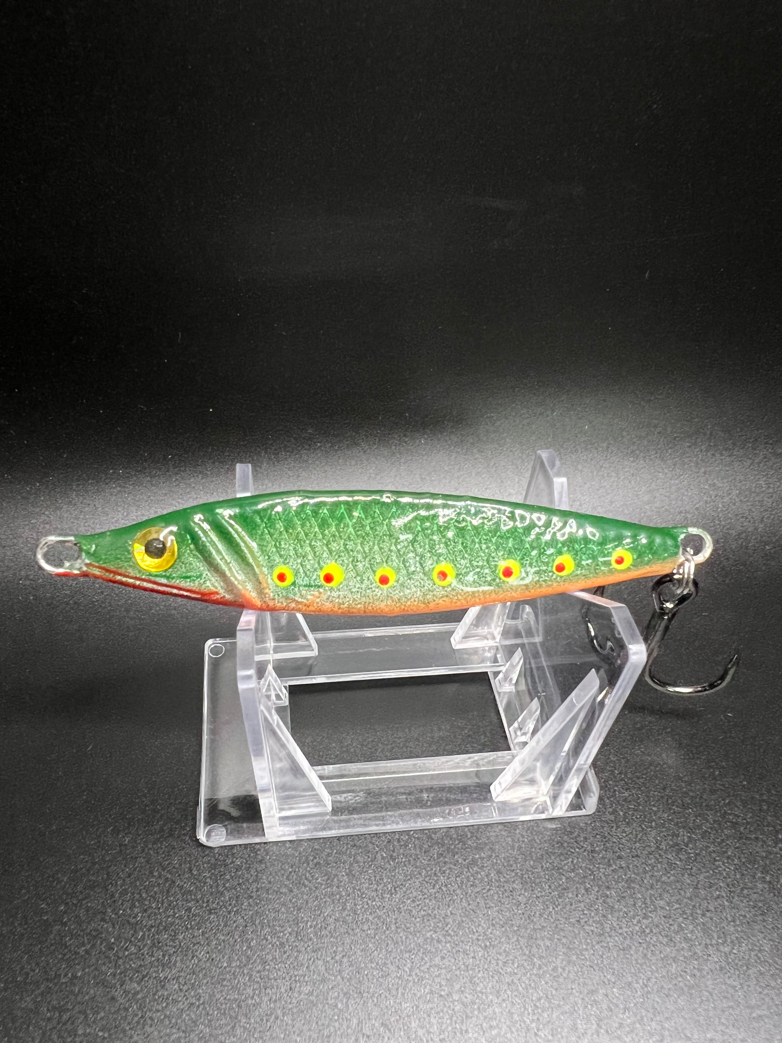 Walleye Prevail 2 oz jigging spoon, green with orange stripe and dot eyes