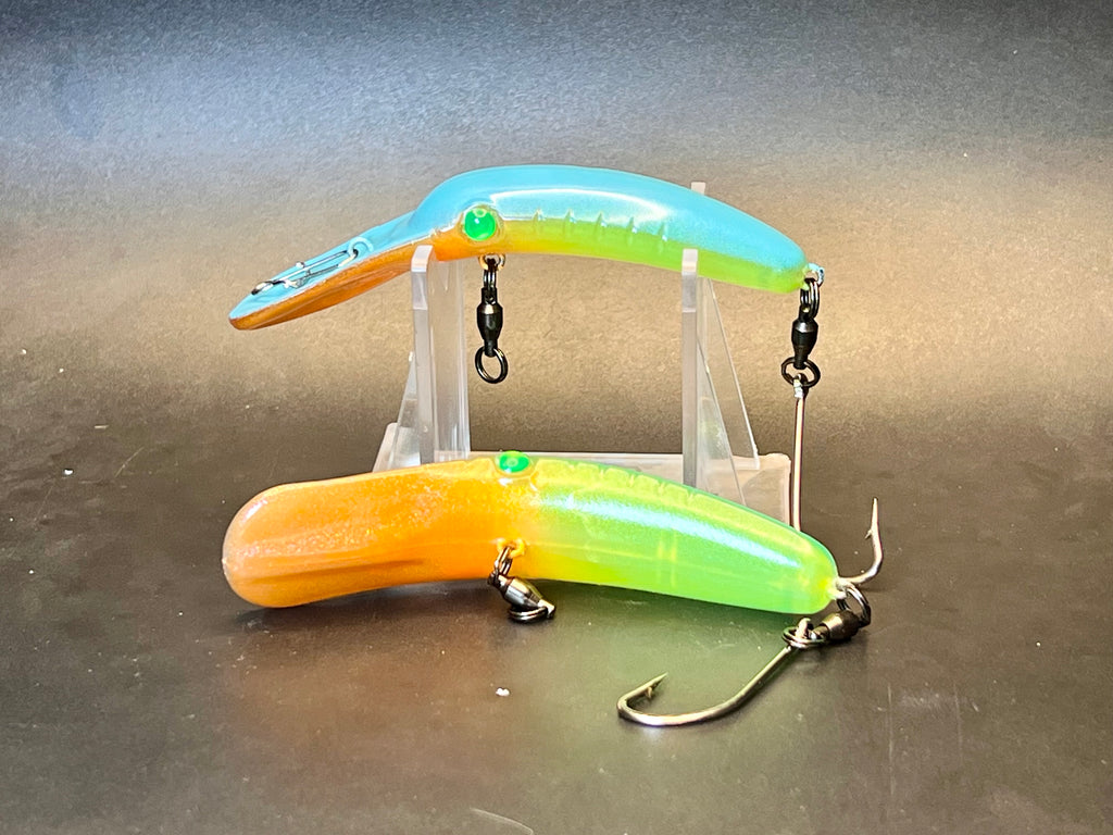 3.3-inch glow fishing lure plug, orange and chartreuse finish with treble hooks