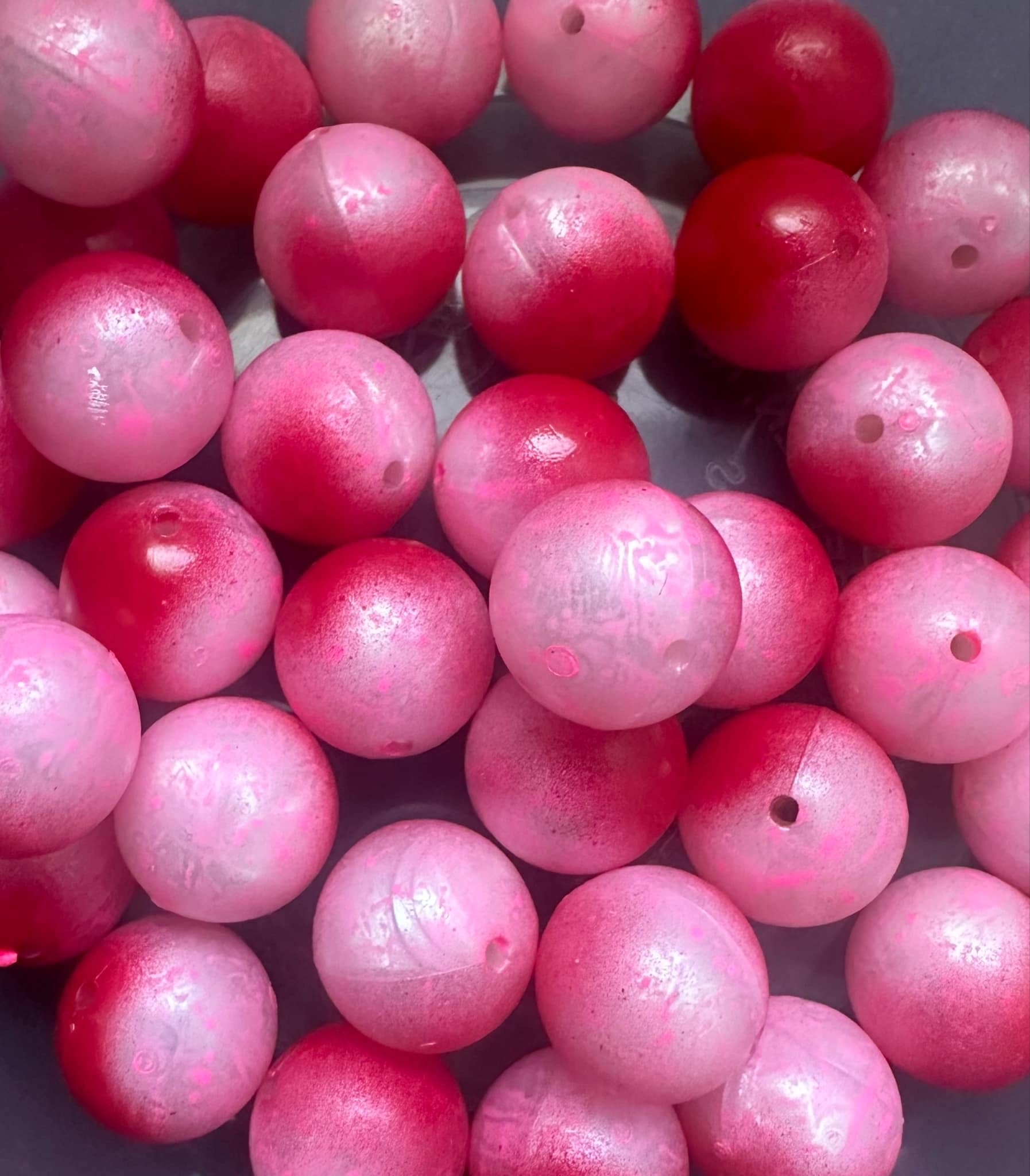 Pink plastic beads (14mm/16mm), round with center holes