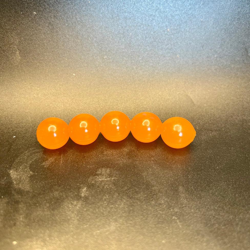 Peachy Keen soft plastic fishing beads, orange round beads with hole