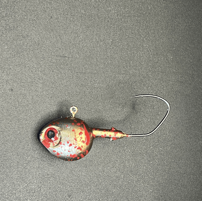 Stark UV Walleye jig, red and white speckled round head with treble hook