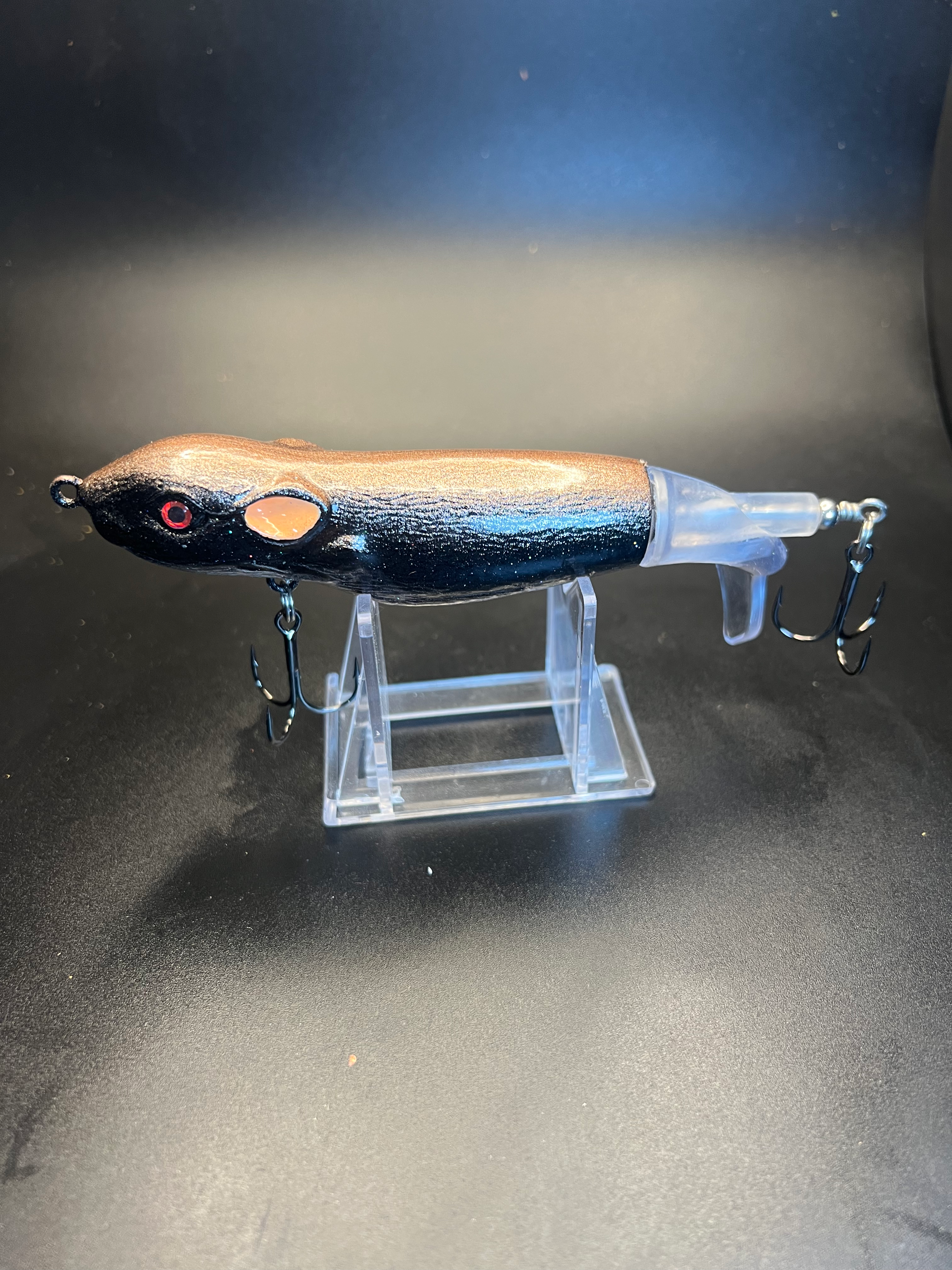 Flopper Plopper 130mm lure in dark blue with amber eye, 3 treble hooks