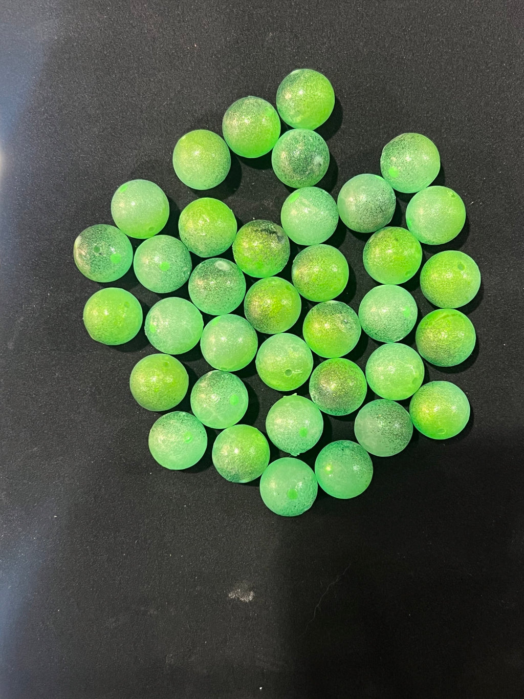 Bright green 14mm triple-glow UV plastic fishing beads, round pellets for fishing.