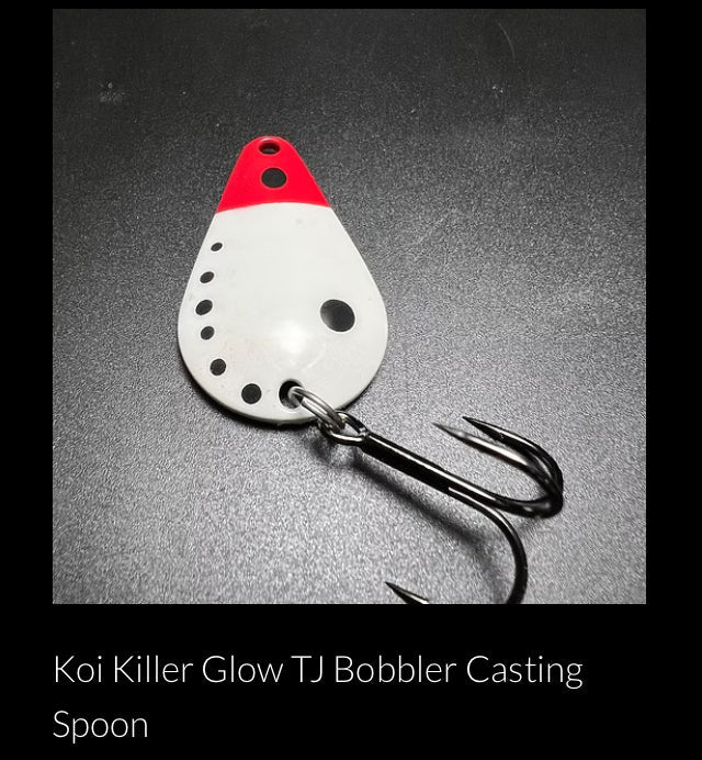 RMA casting spoon with white body, red top, and treble hooks