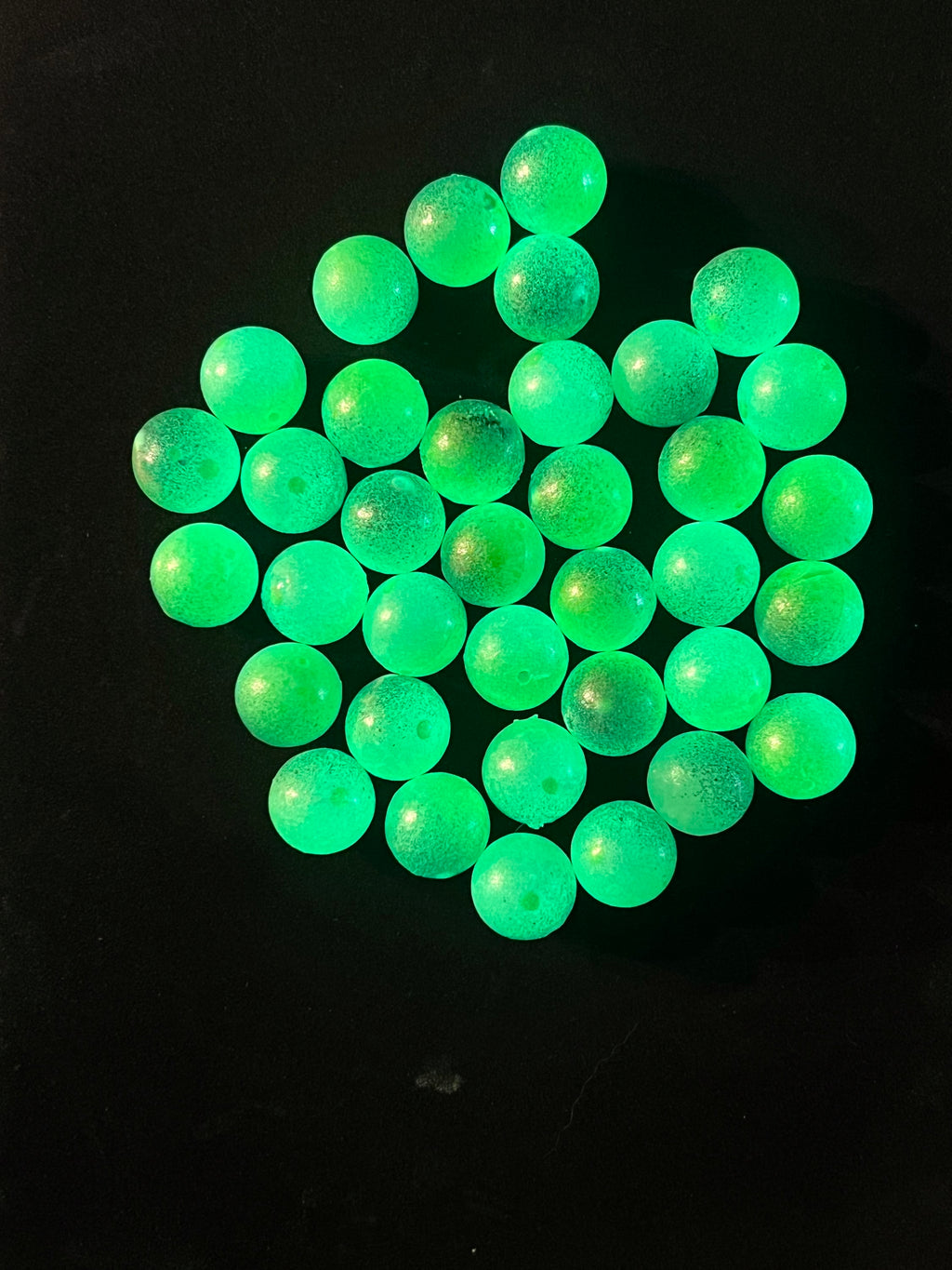 14mm UV glow plastic fishing beads, bright green—steelhead and salmon tackle.