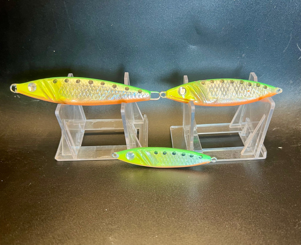 Three Tiger Kang UV Glow 1.25 oz spoons on clear rack, green-yellow/ orange