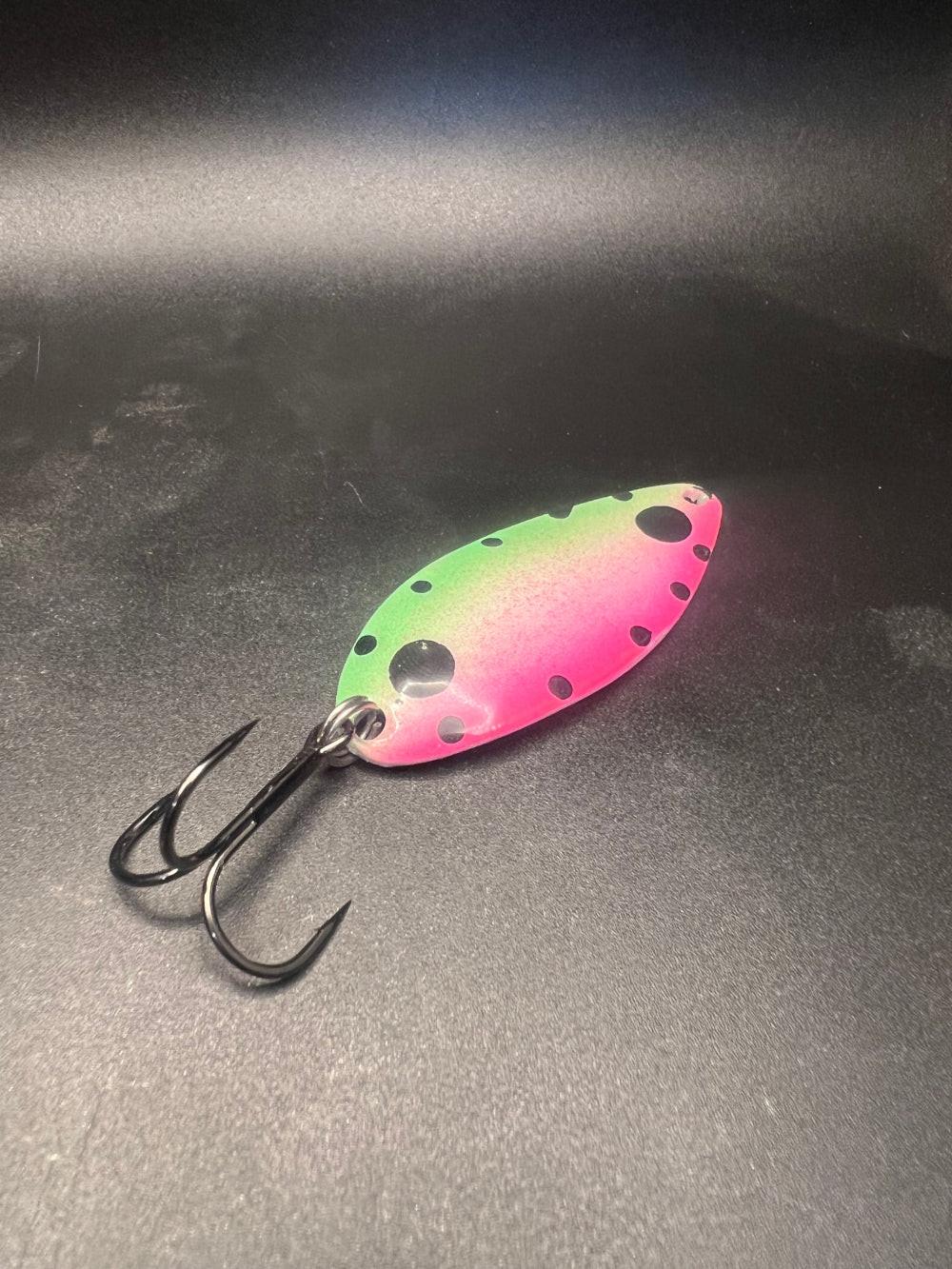 Mars Mellon Super Glow Cletus lure with pink-green oval body and black spotted finish