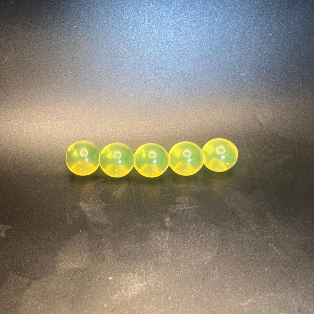 Solar roe soft plastic beads, five translucent lime-green balls
