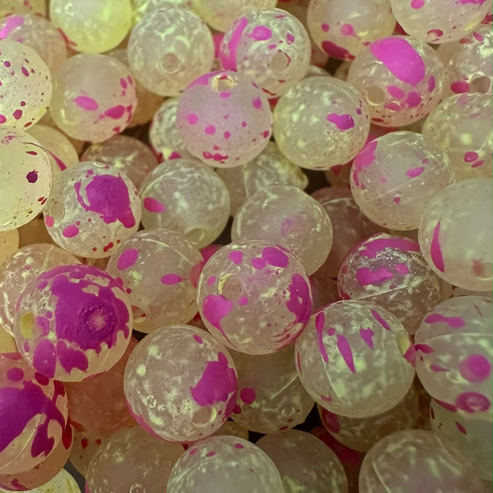 UV Glow fishing beads with pink splatter paint spots