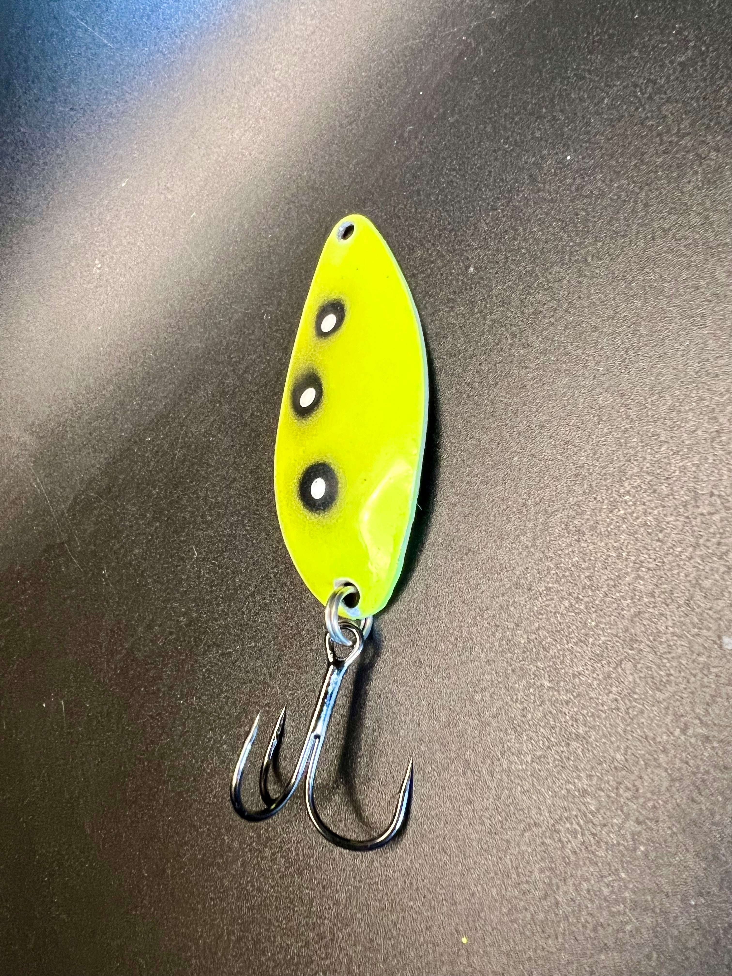 1/2 oz Little Cletus lure: neon yellow with black spots and treble hooks