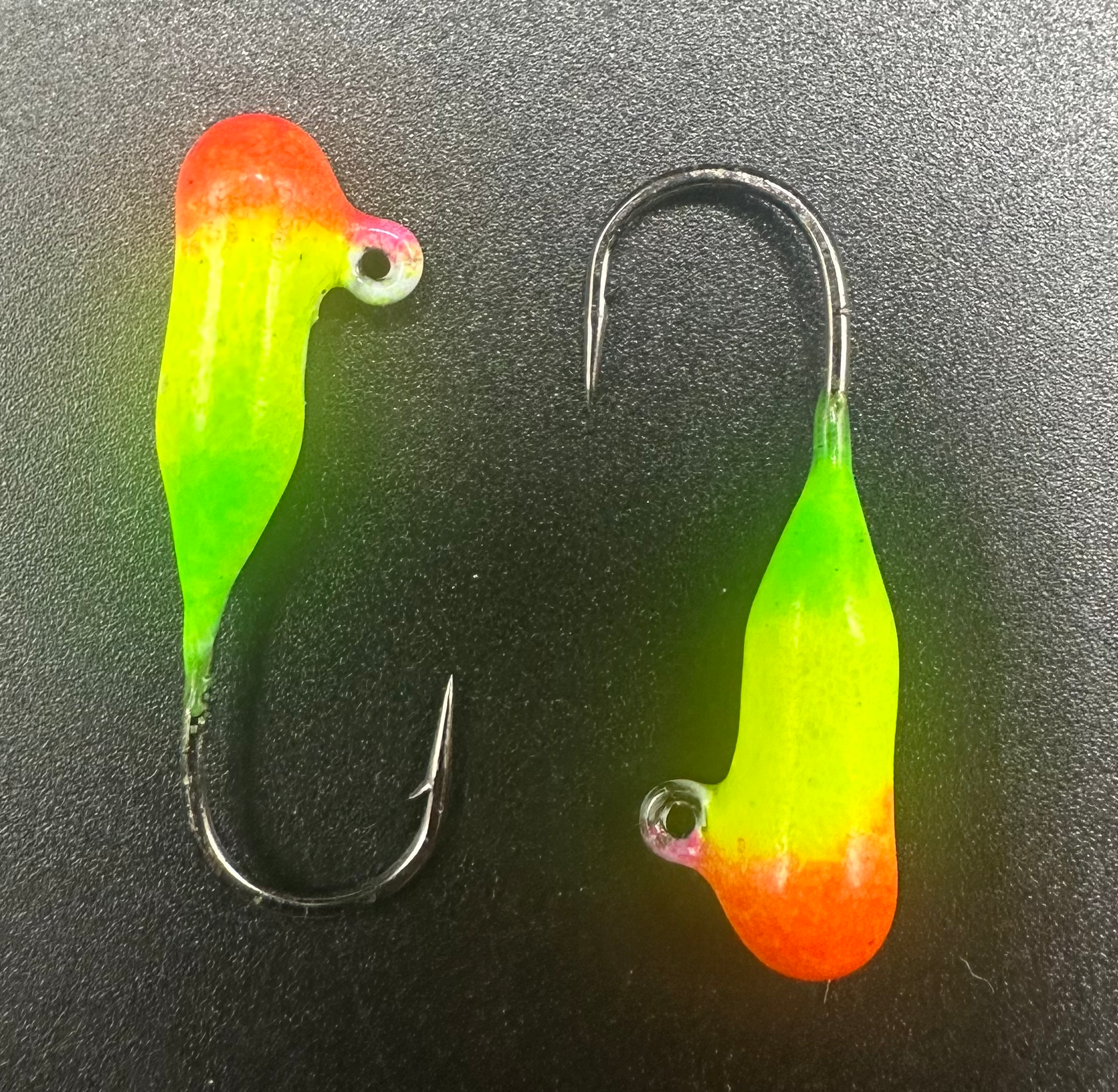 Steelhead tube jig, chartreuse body with orange tail, offset hook