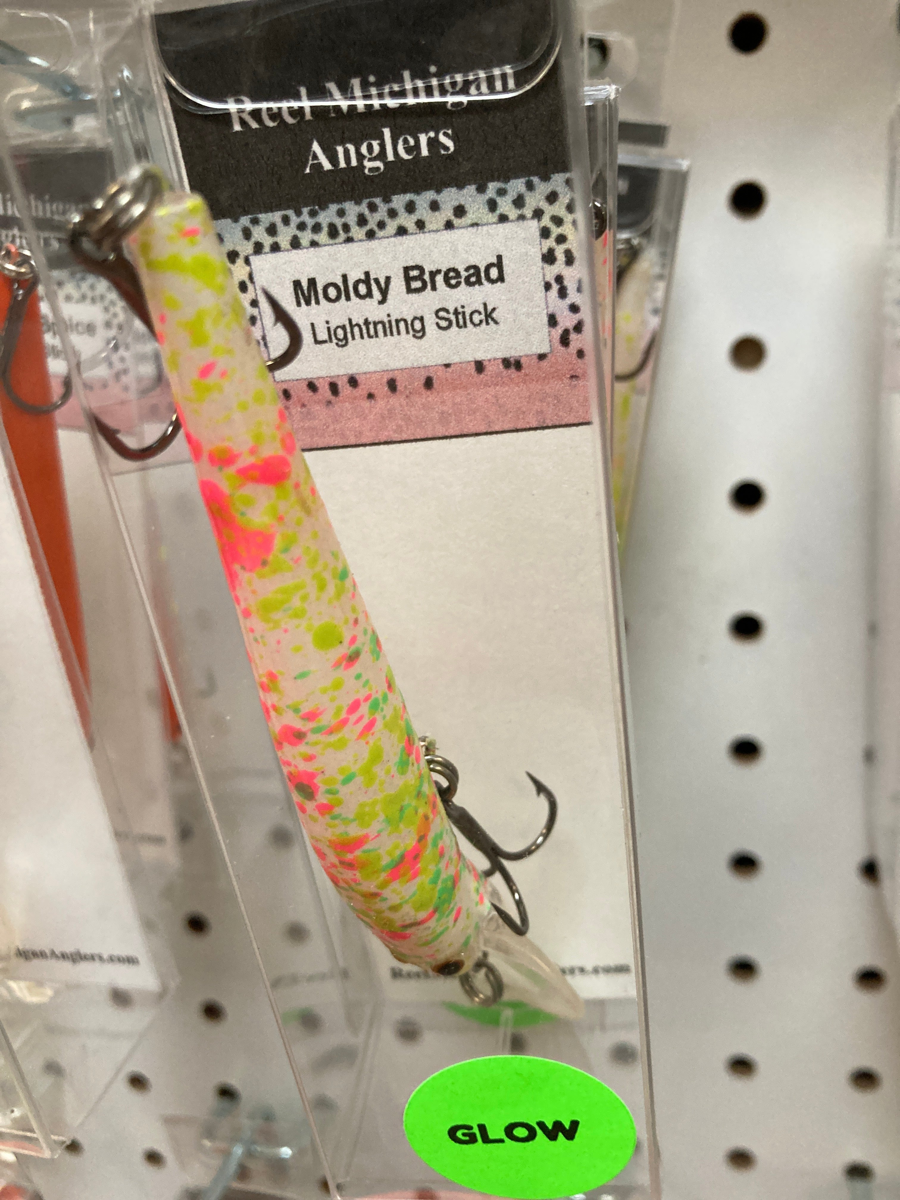Light green and pink speckled fishing lure with #6 hook and treble hooks.