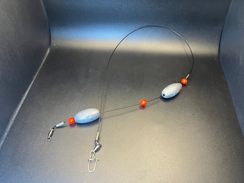 Carolina rig bottom rig with blue sinker, orange bead, red accents and swivel