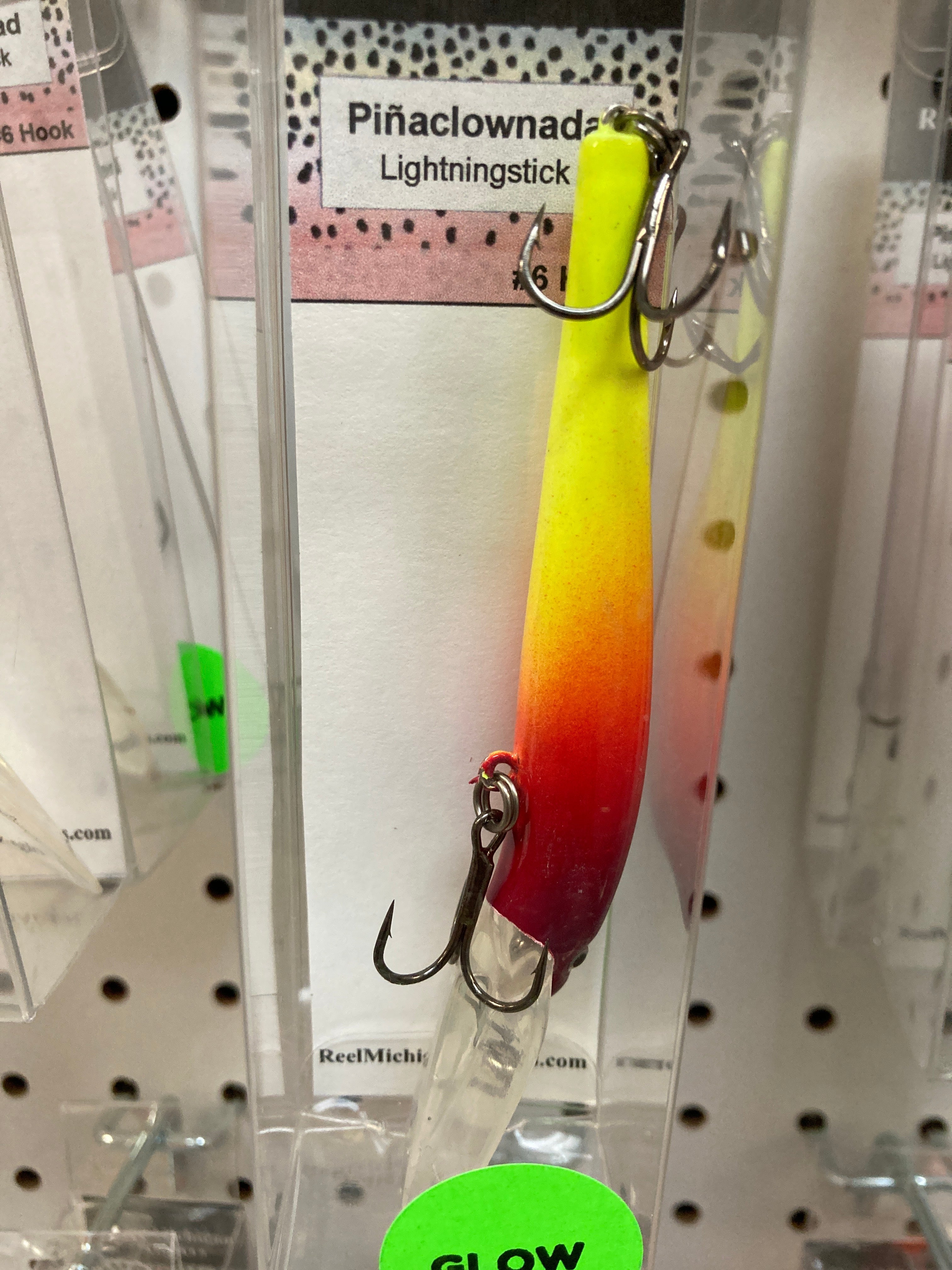 Yellow-to-orange gradient fishing lure with #6 hook and treble hooks.