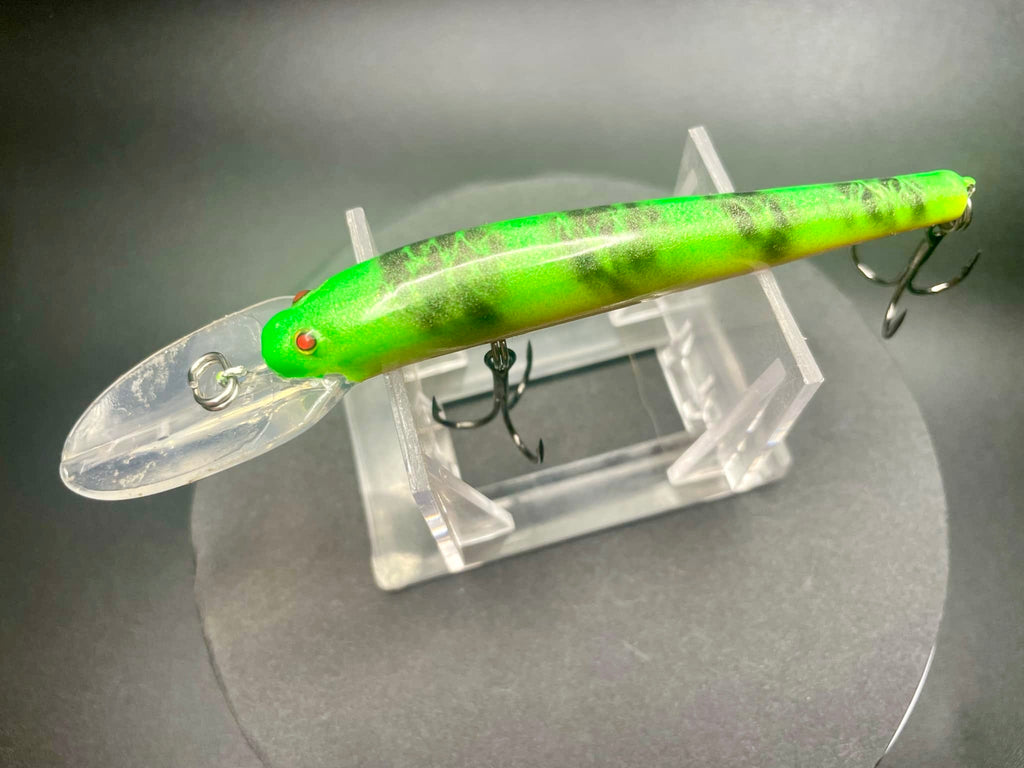 Lightningstick UV Glow 3X strong hooks lure, neon green top with orange underside