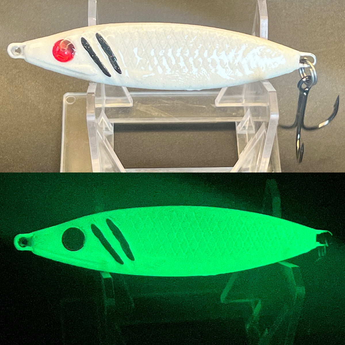 Salmon jigging spoon with UV glow stripes, white and green lure shown