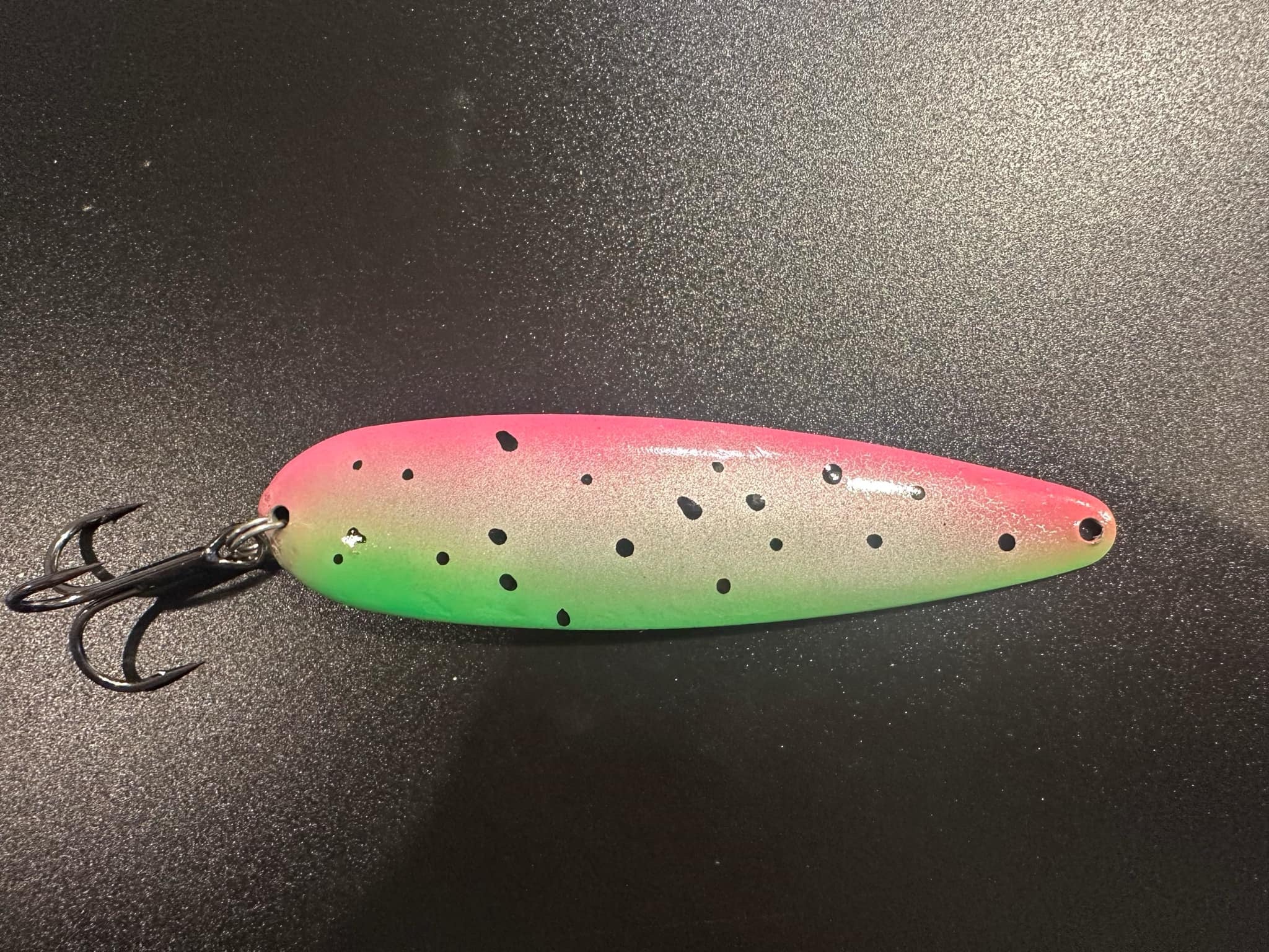 Troutermellon trolling spoon lure, pink-green with black spots and treble hook