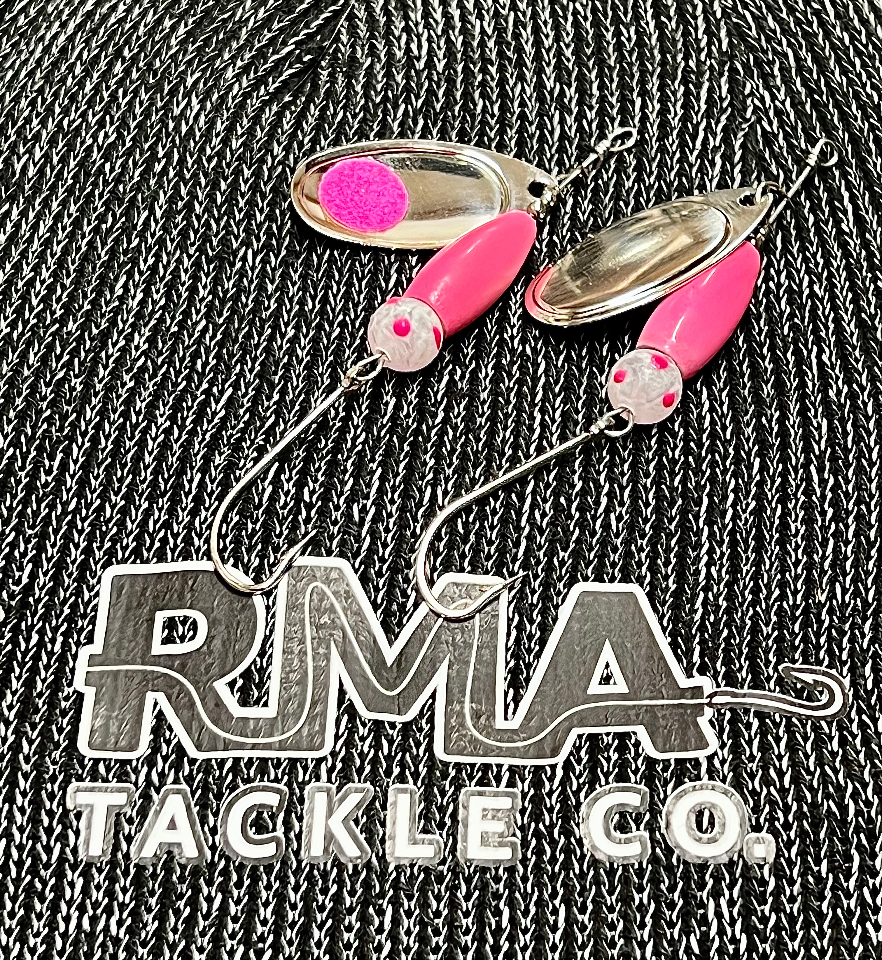 Pink inline spinner fishing lures with chrome blades and pink bodies
