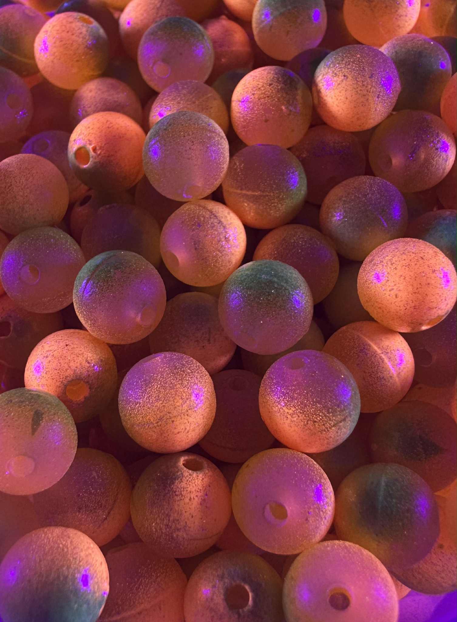 Sault St. Sunrise UV Glow fishing beads, round plastic beads with purple UV glow