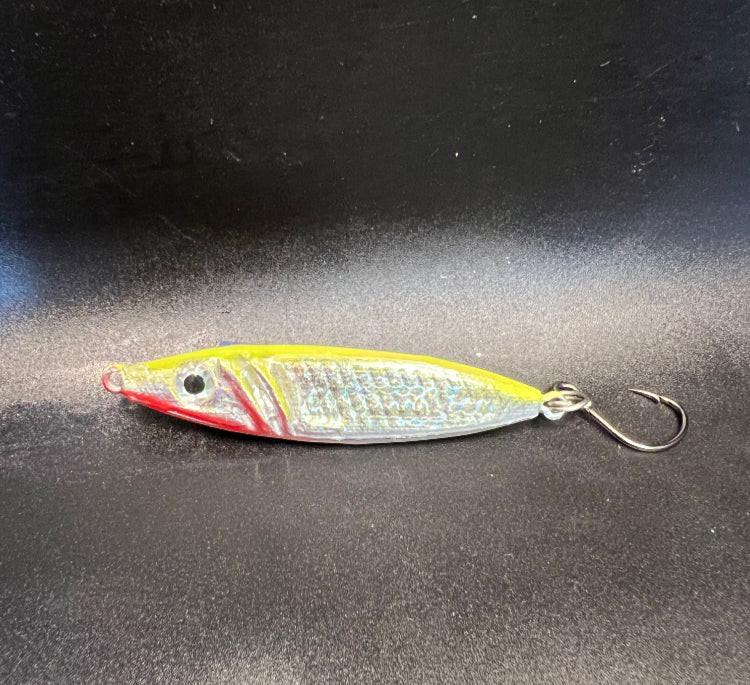 Yellow and silver jigging spoon with red accents, 3/4 oz, treble hook