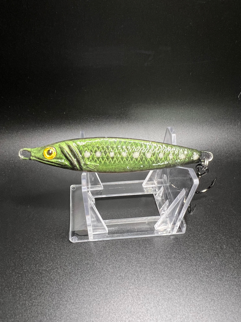 2 oz jigging spoon: chartreuse green with UV glow and treble hooks