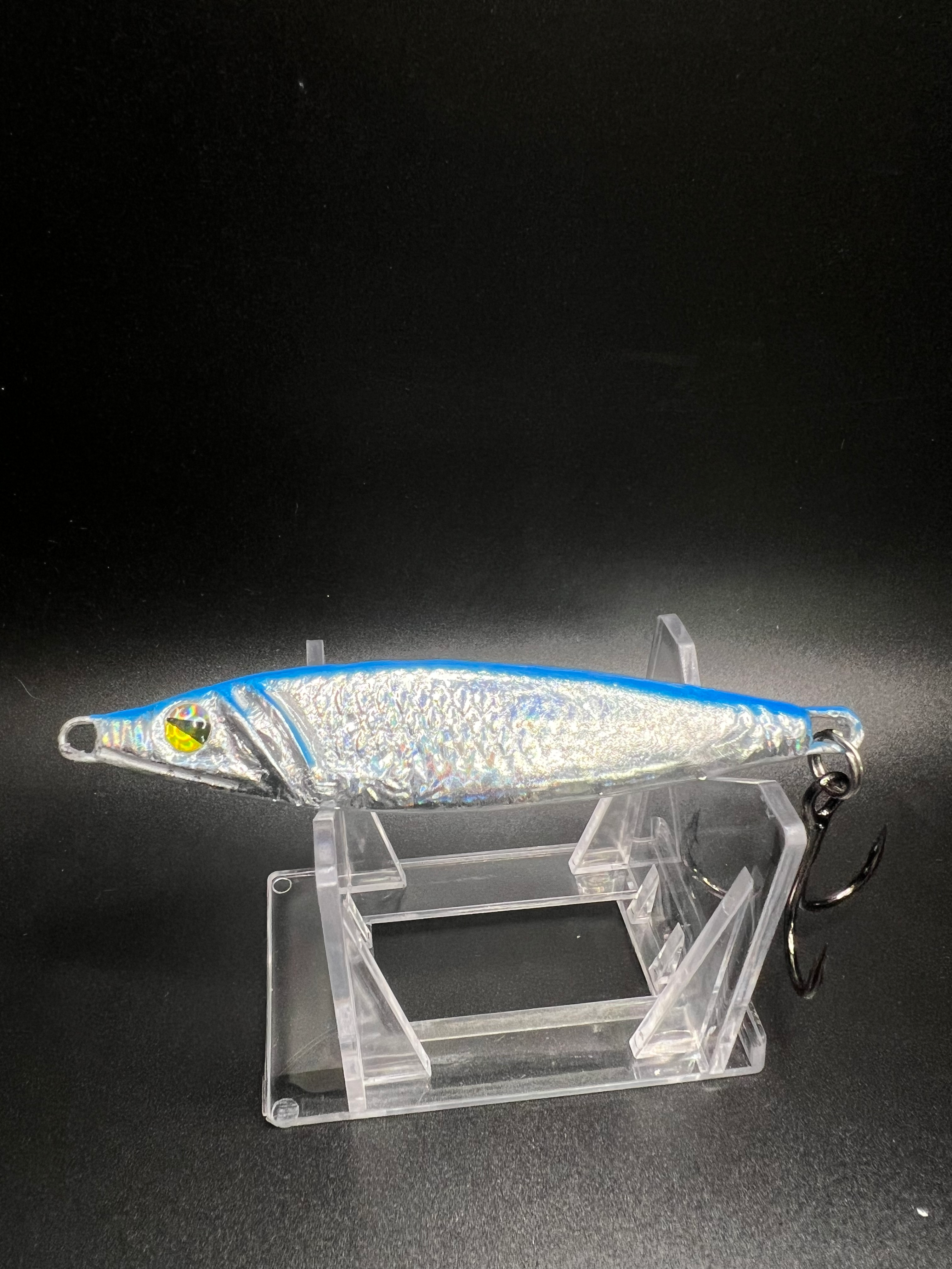 Oceanless In White 2 oz Jigging Spoon—iridescent silver with blue stripes