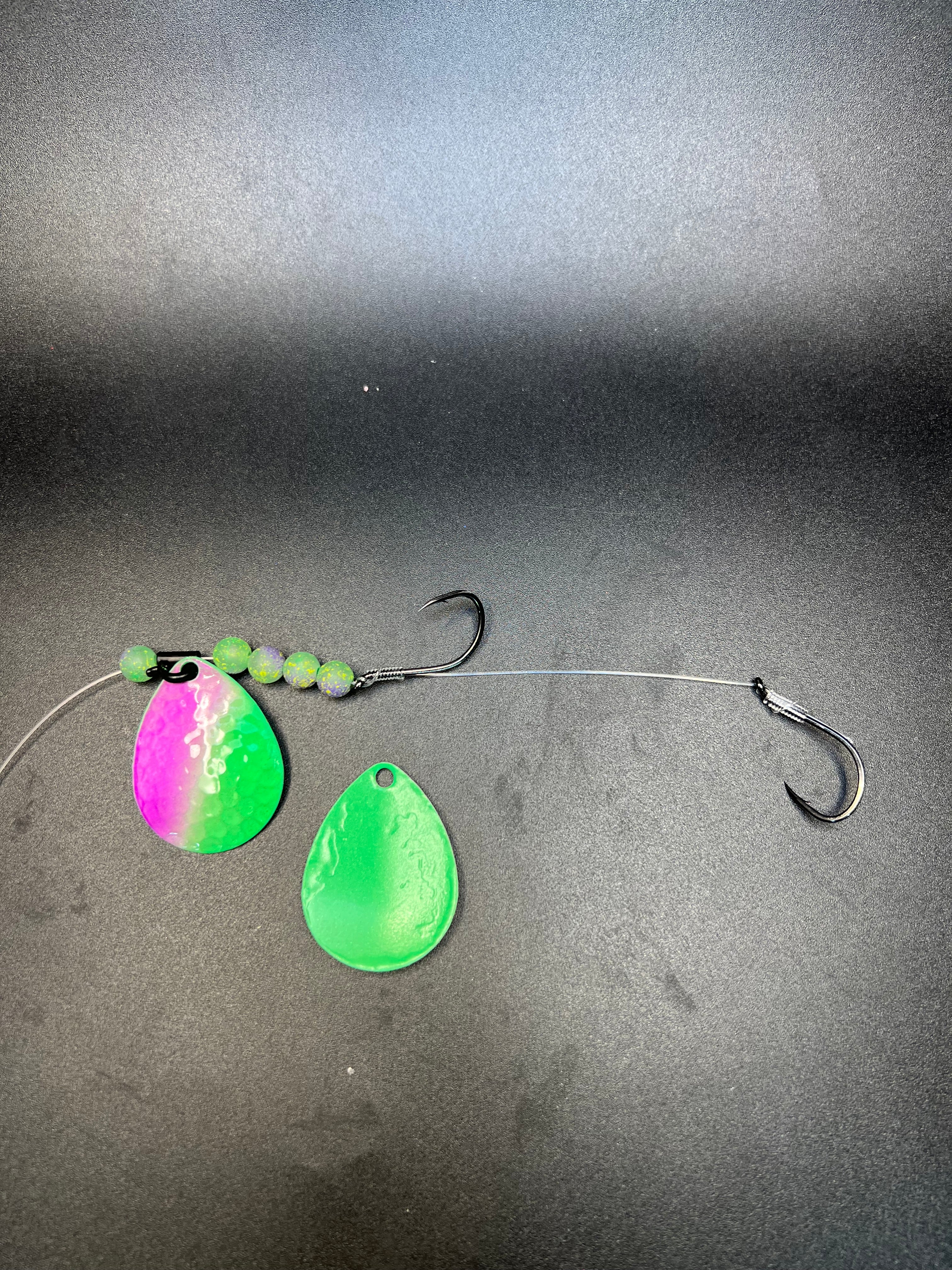 Fishing lure harness with two teardrop spinner blades, beads, and metal hooks