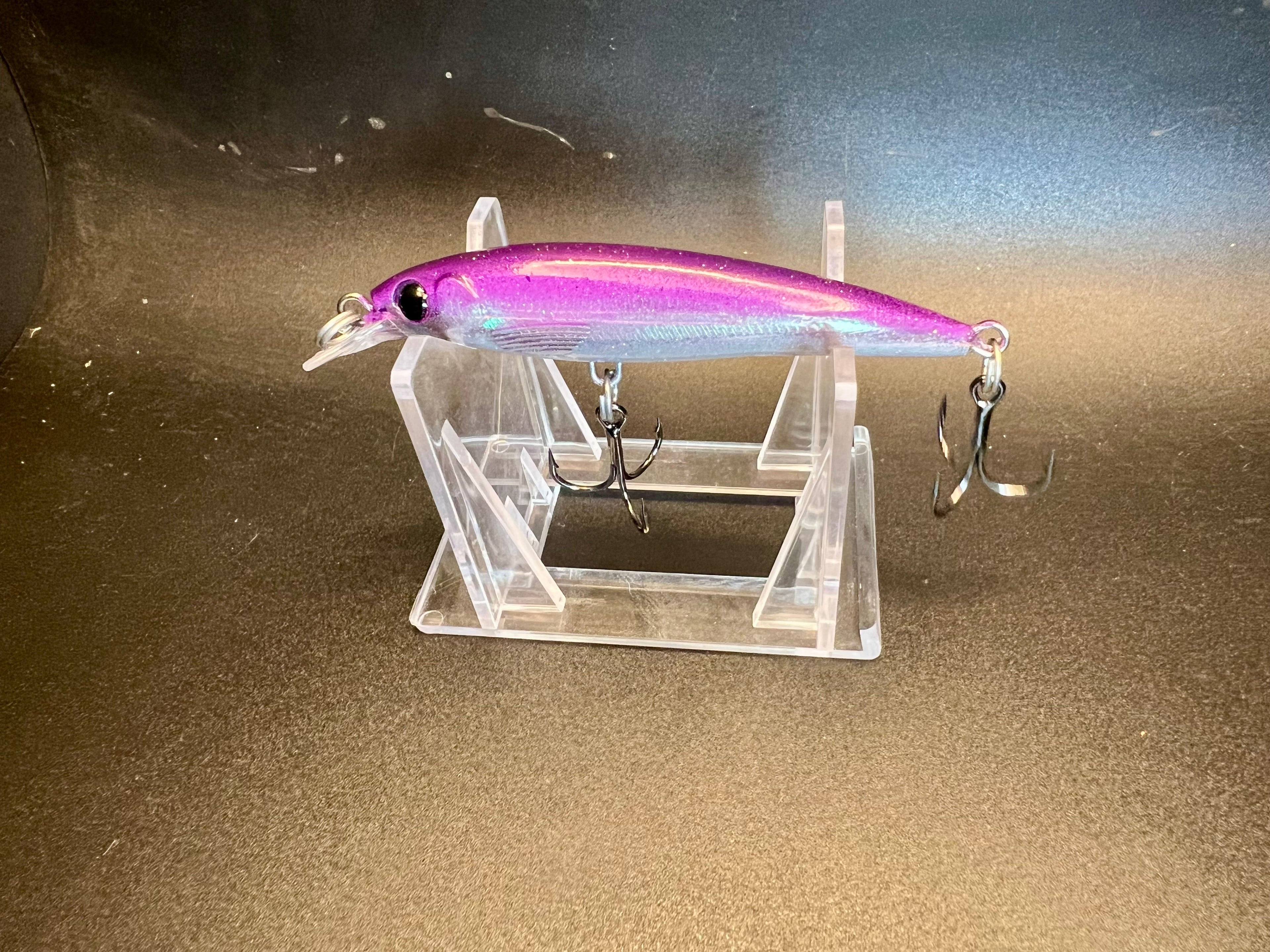3-inch iridescent purple hard bait lure with metal lip and two treble hooks