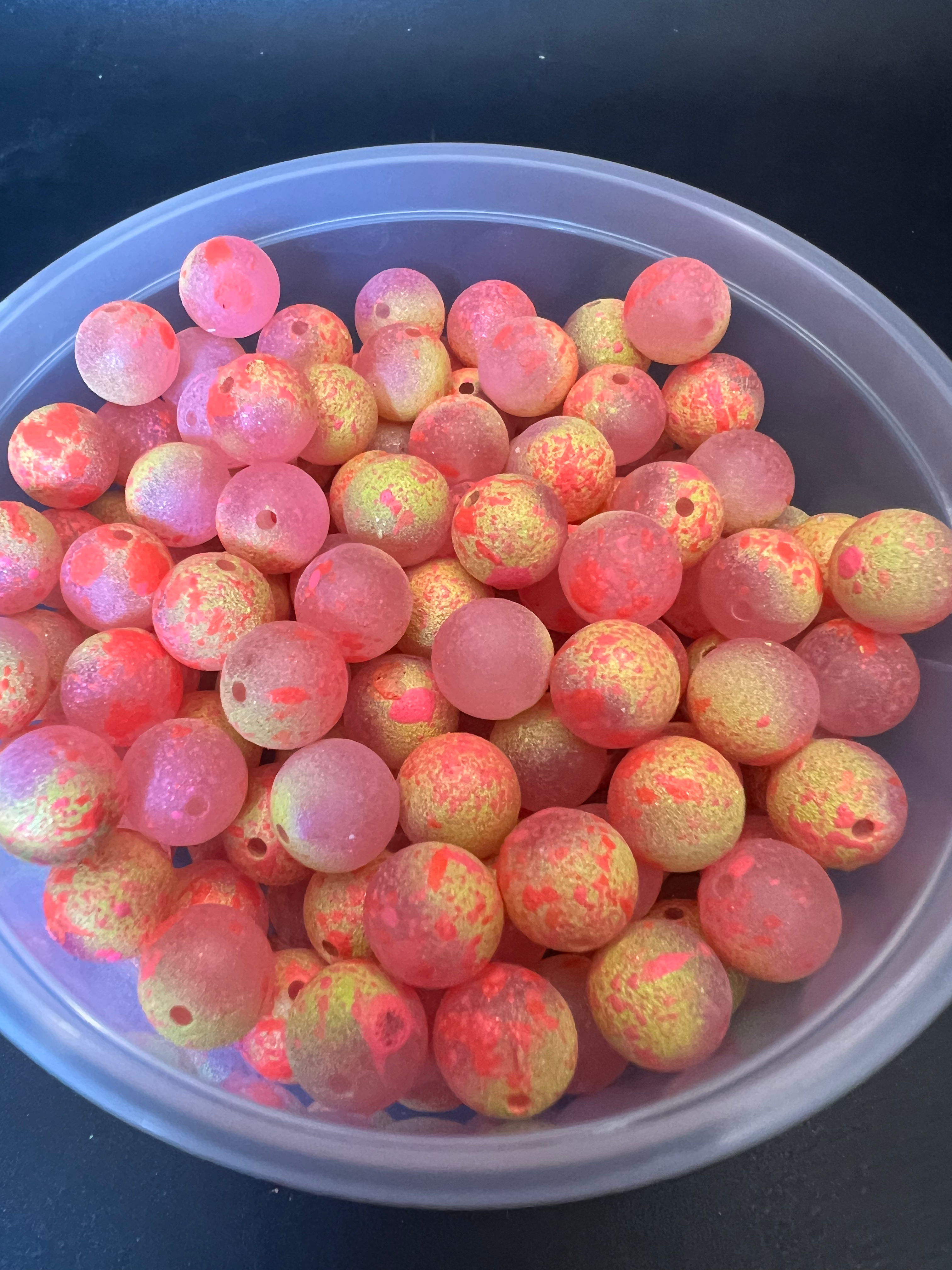 Limited edition UV glow fishing beads, pink plastic spheres with speckled yellow detail