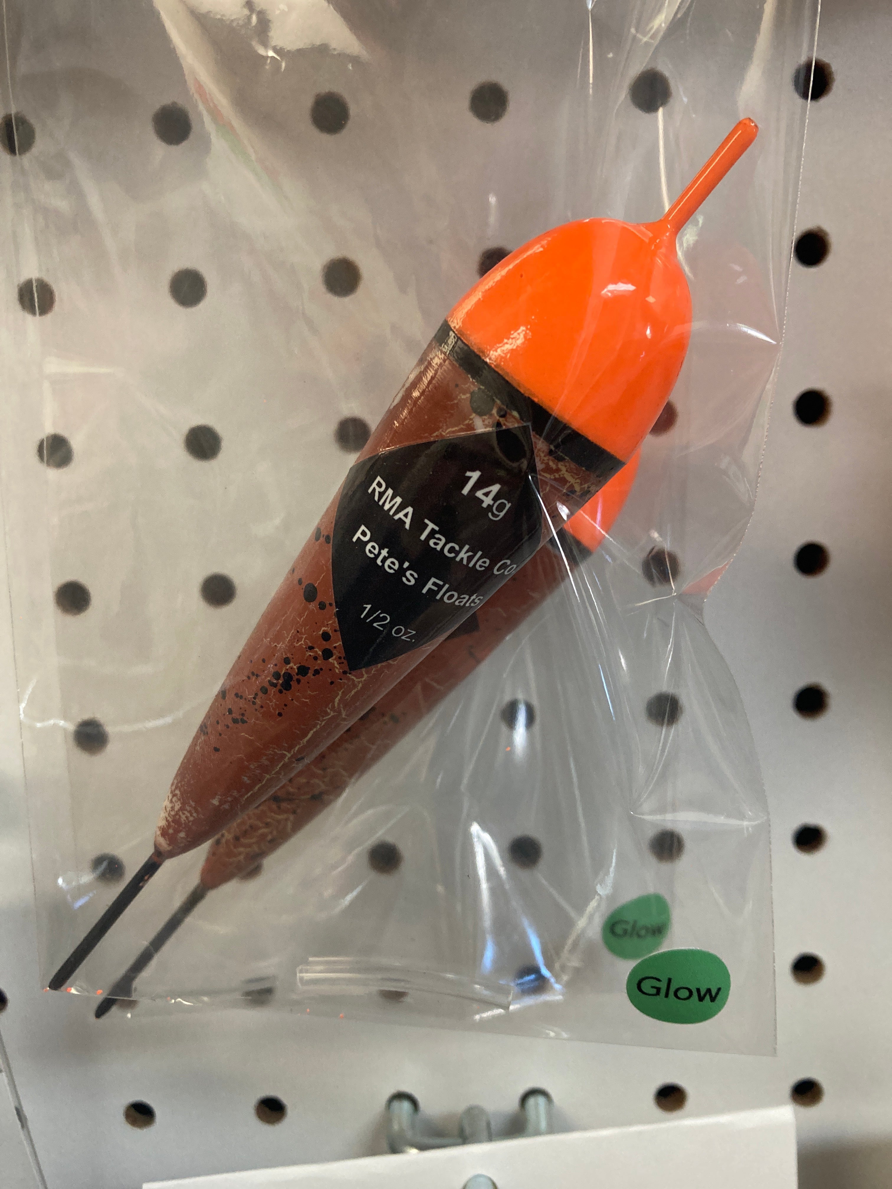 Fishing float in clear bag, orange cap with black band, dark brown body, 14g