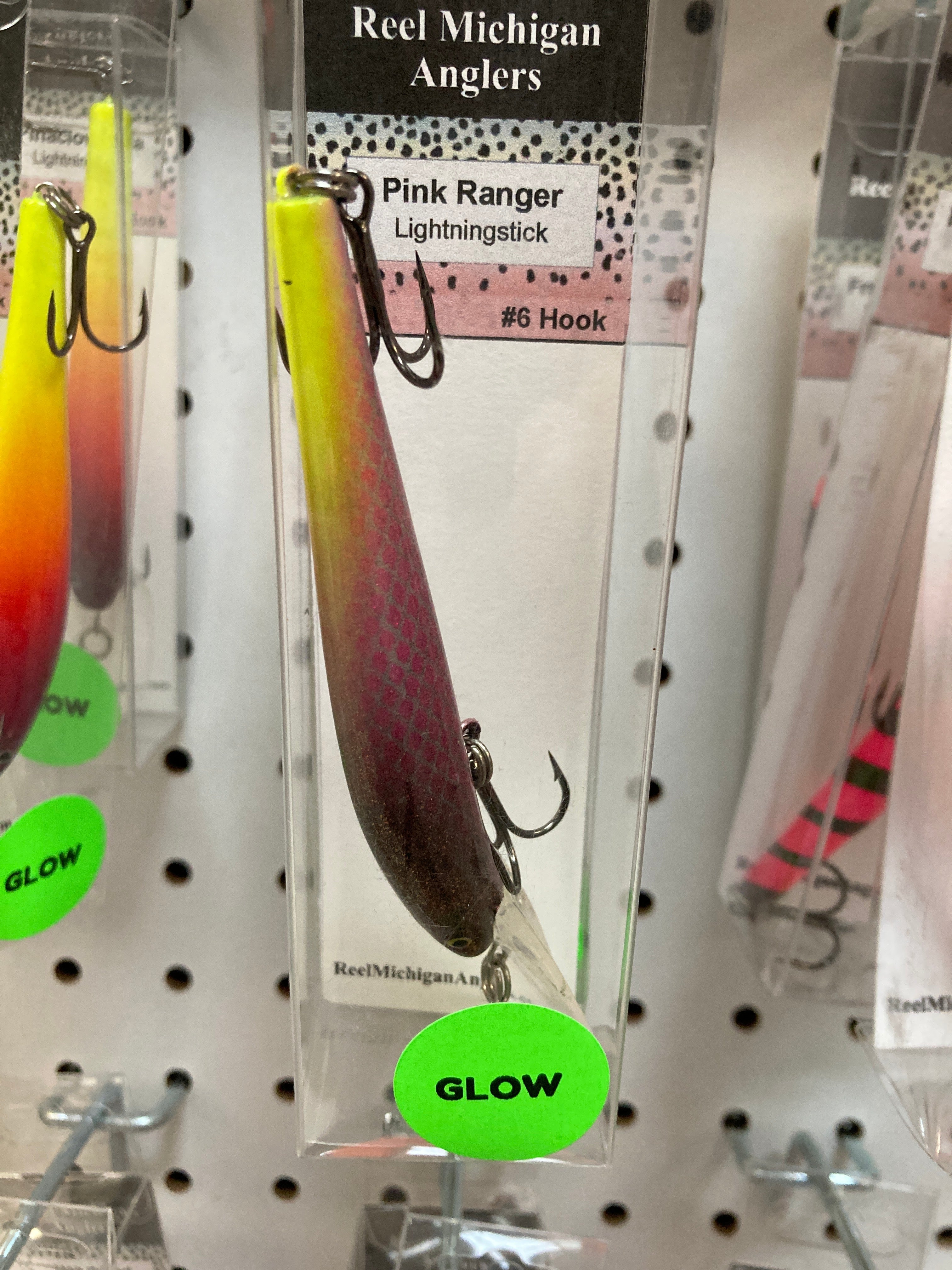 Red-brown gradient fishing lure with #6 hook and treble hooks.