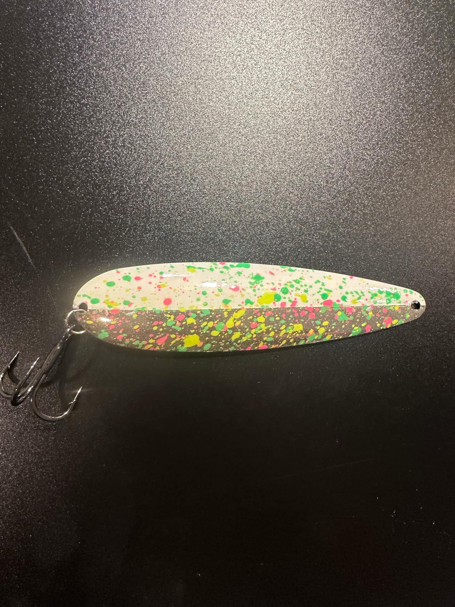 Moldy Bread trolling spoon lure with multicolor speckled blade and treble hooks