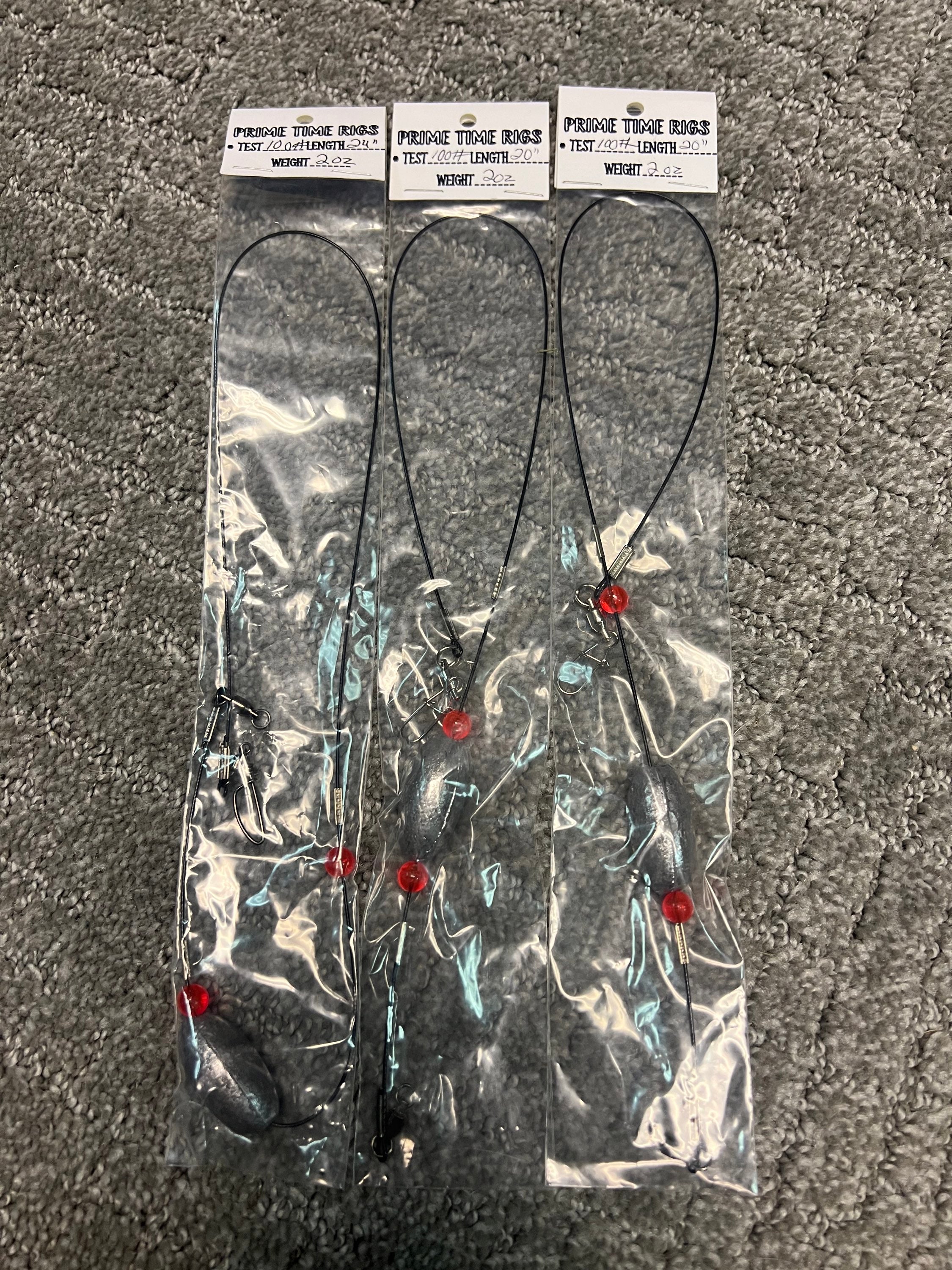 Carolina rig bottom leaders in clear bags with red beads and metal snaps