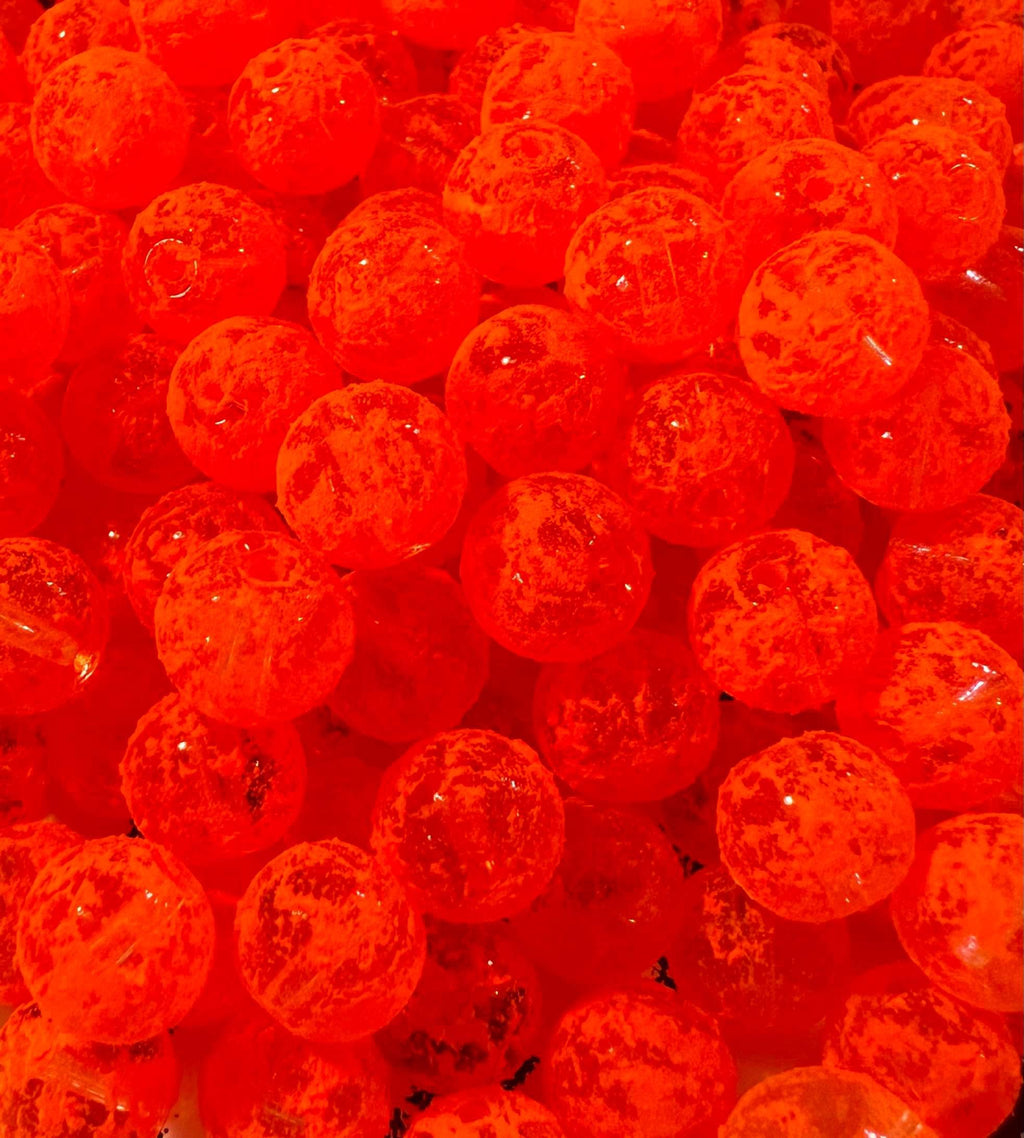 Round orange glass fishing beads with speckled finish