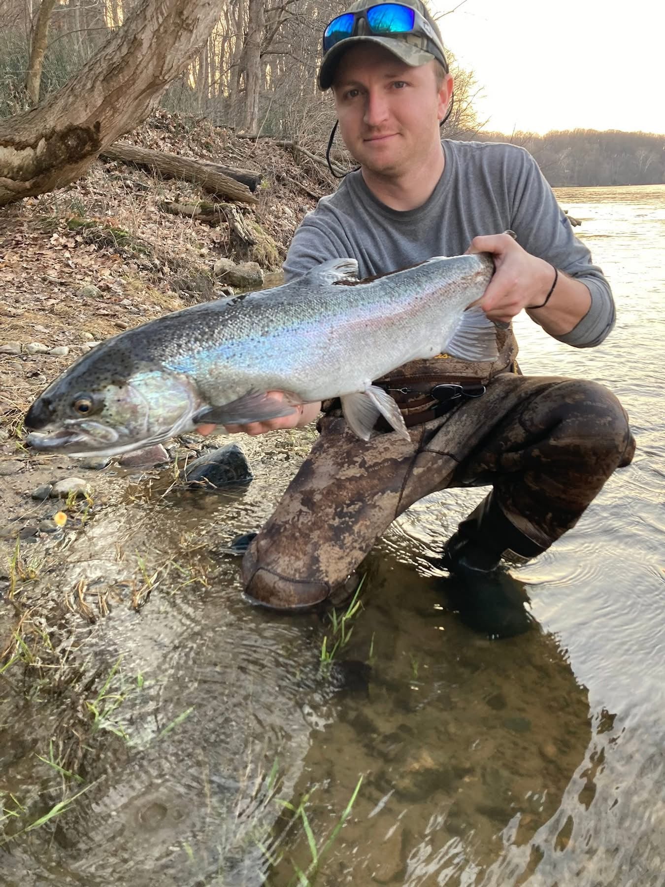 Steelhead/salmon-style fish with a UV-glow bead on the line near the head
