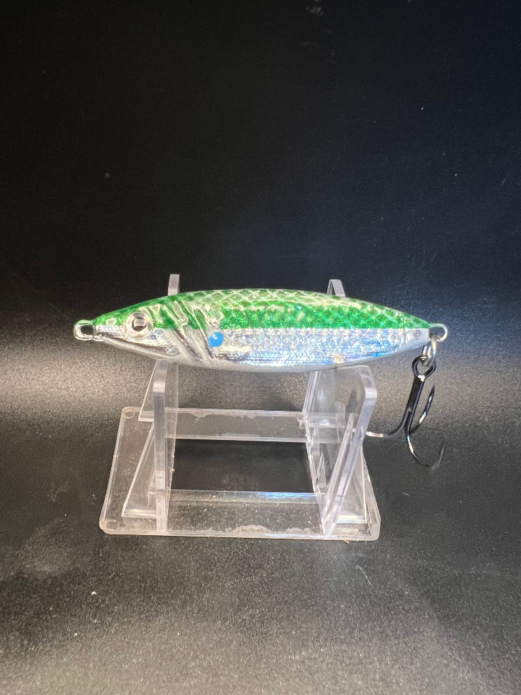 UV 1.25 oz jigging spoon with green stripe on silver-blue, split rings and treble hook