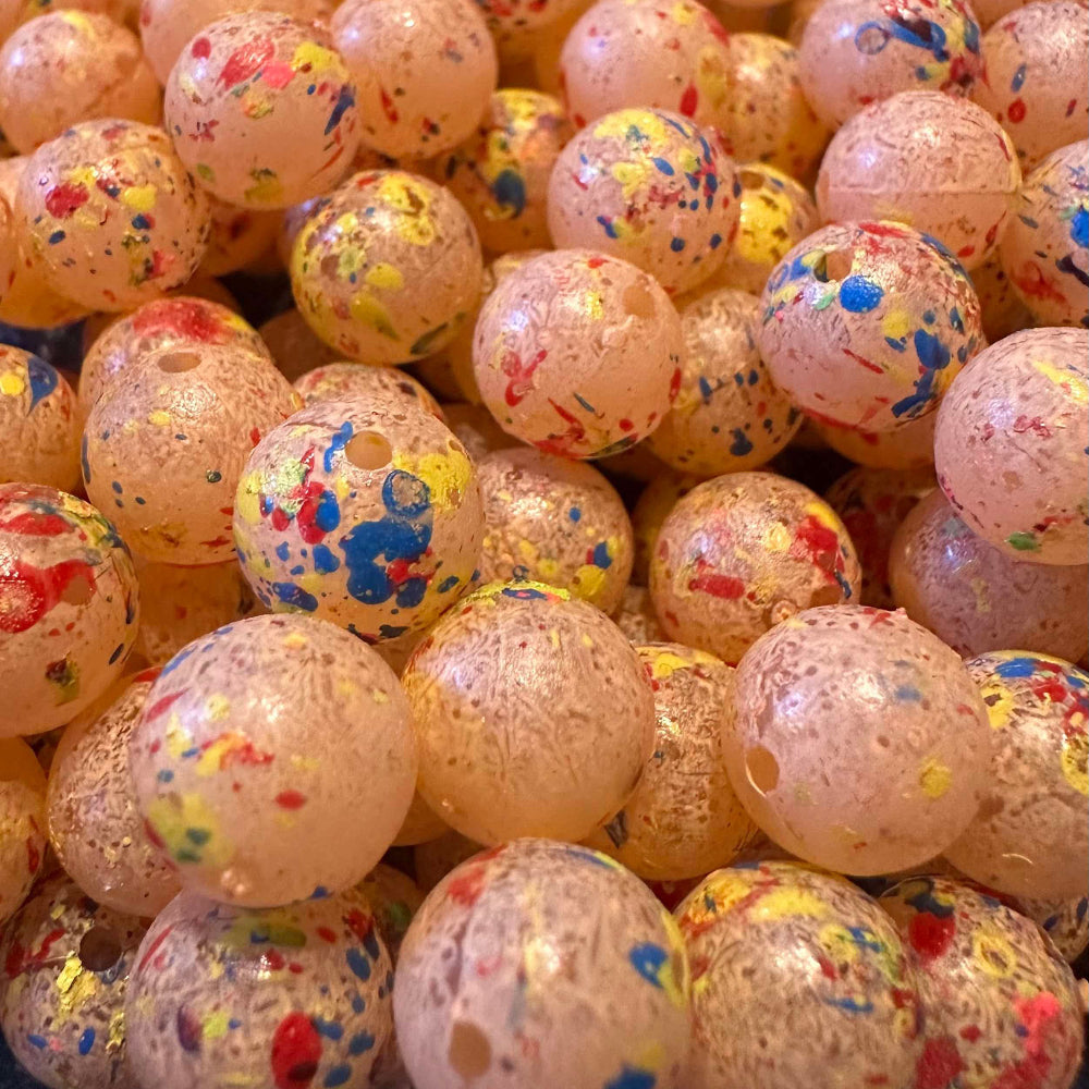 Peach UV glow fishing bead, plastic ball with colorful speckled paint detail
