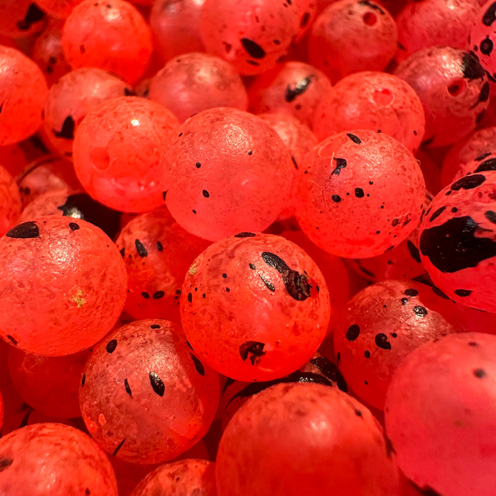 Red UV glow plastic fishing beads with black speckles for steelhead/salmon