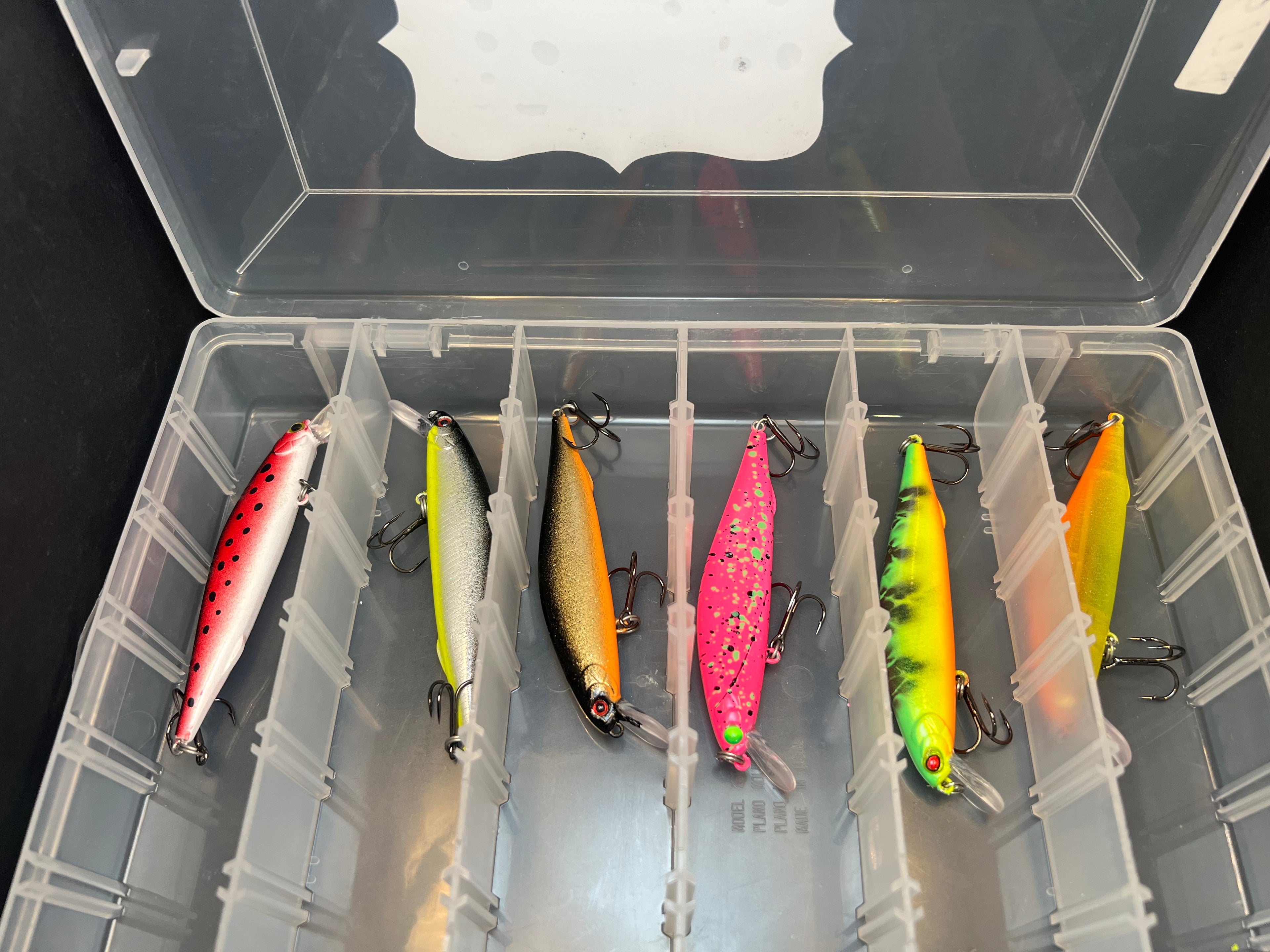 Clickbait Jerkbait Box open, clear compartments with colorful lures inside