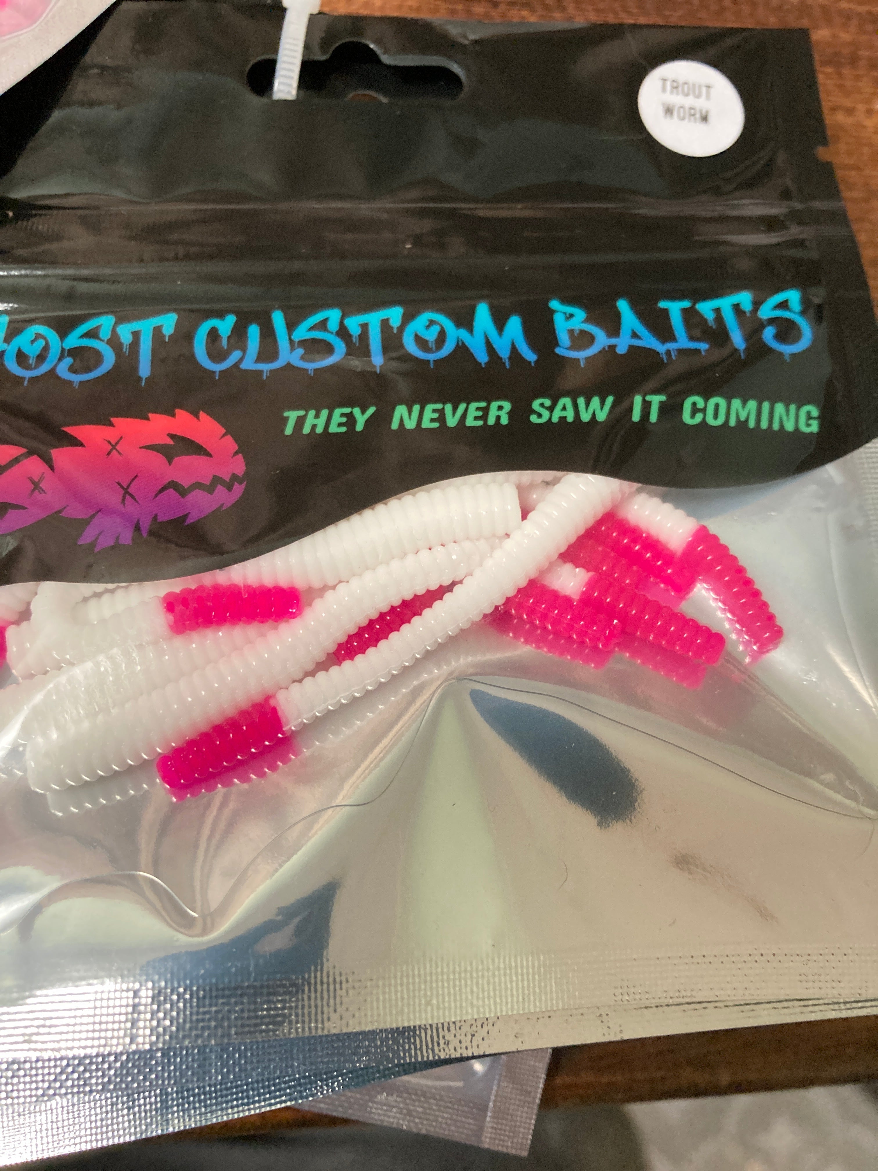 White custom worm bait with pink tail, ridged bodies in a single pack