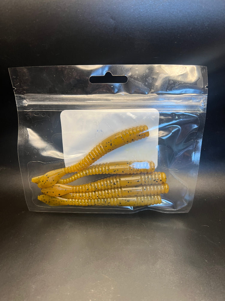 Soft plastic crawler bait set in yellow/gold with ribbed segmented bodies in clear bag