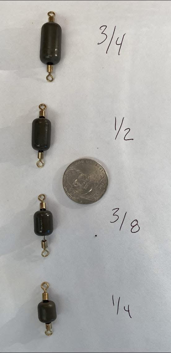 Tungsten inline sinker set with dark gray weights and gold swivel eyelets