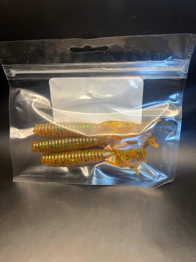 Soft plastic crayfish lure set in orange-yellow bodies with speckled claws