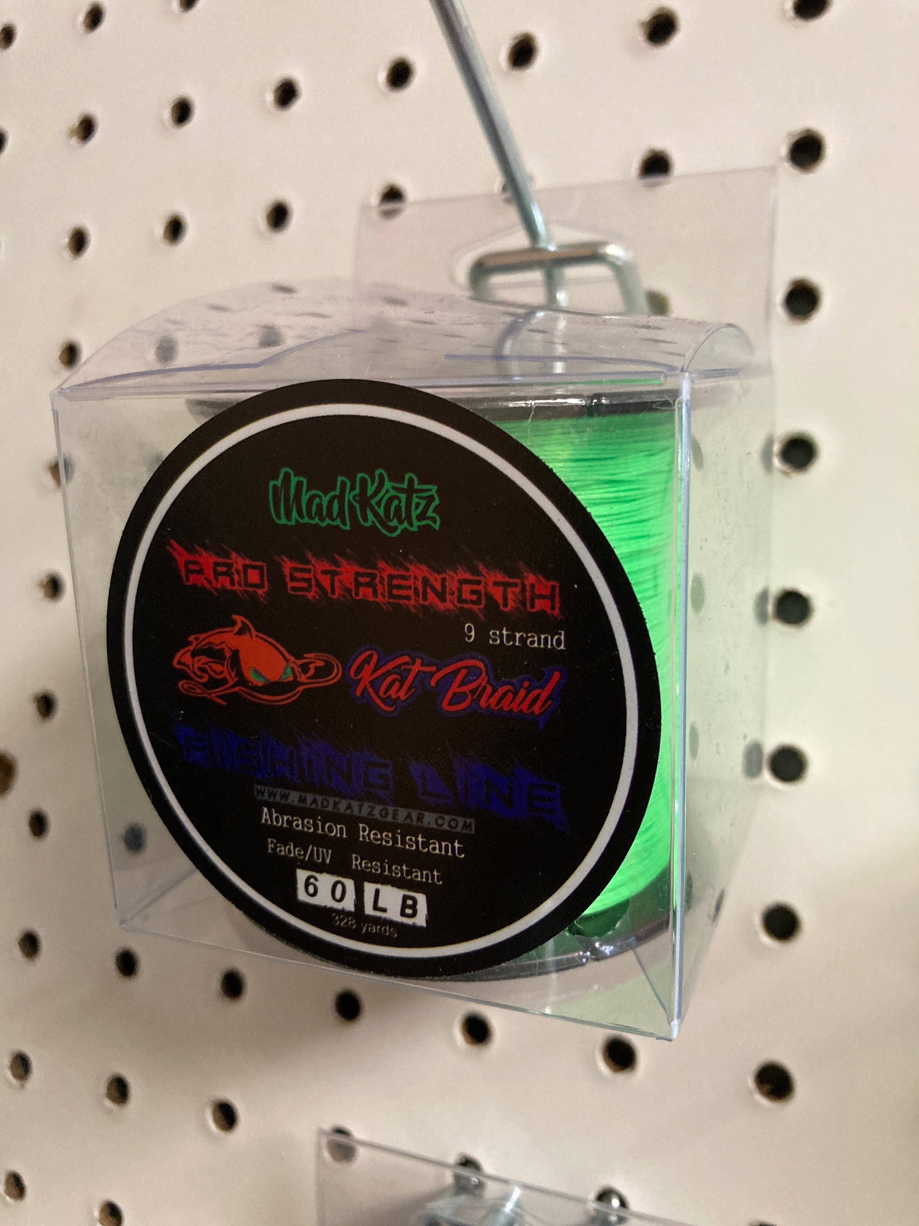 Madkatz 60 lb neon green braid fishing line, clear spool package with label