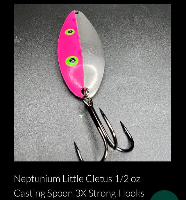 Pink casting spoon with green dot accents and three treble hooks