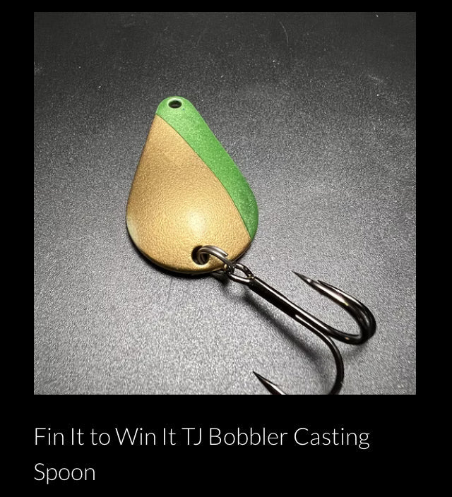RMA casting spoon with green top, gold body, and treble hooks