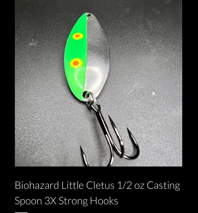 Green casting spoon with multicolor dot accents and three treble hooks